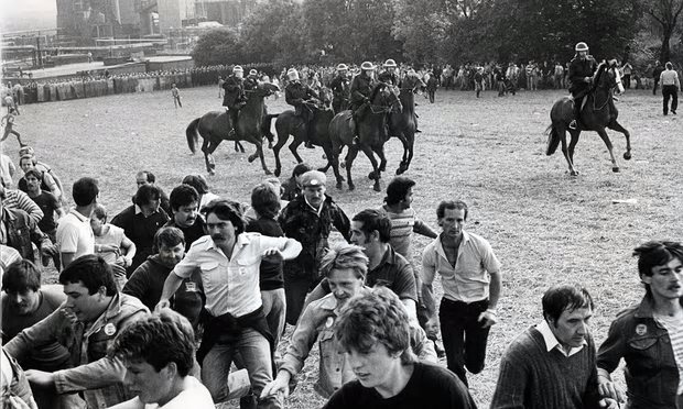 Striking miners flee a charge by mounted police at Orgreave coking works in south Yorkshire in 1984 [Image: Rex].