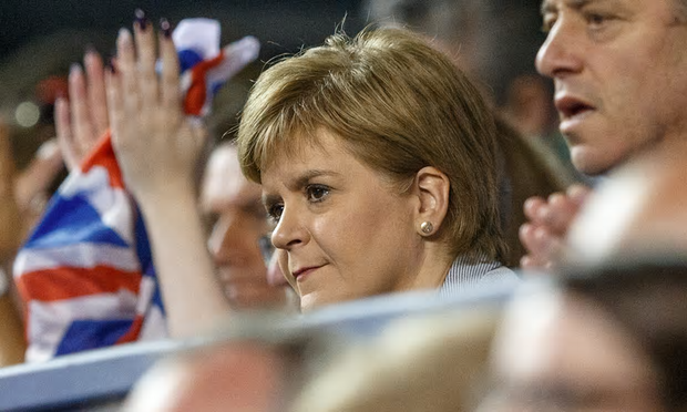 Nicola Sturgeon watches Andy Murray in Glasgow on Sunday. Her party believes a single market guarantee would boost support for independence [Image: Robert Perry/EPA].