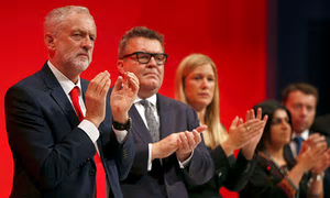 Jeremy Corbyn with Tom Watson, among others, at the Labour party conference in Liverpool [Image: Peter Nicholls/Reuters].